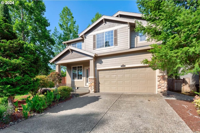 craftsman-style home with a porch and a garage