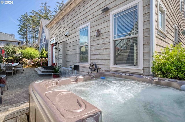 view of patio with a hot tub