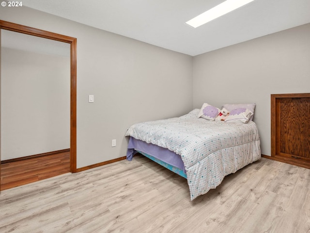 bedroom featuring light hardwood / wood-style floors