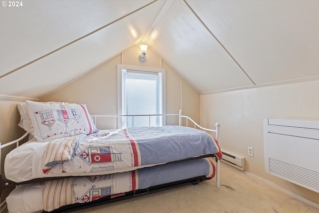 bedroom featuring a baseboard heating unit, vaulted ceiling, and carpet floors