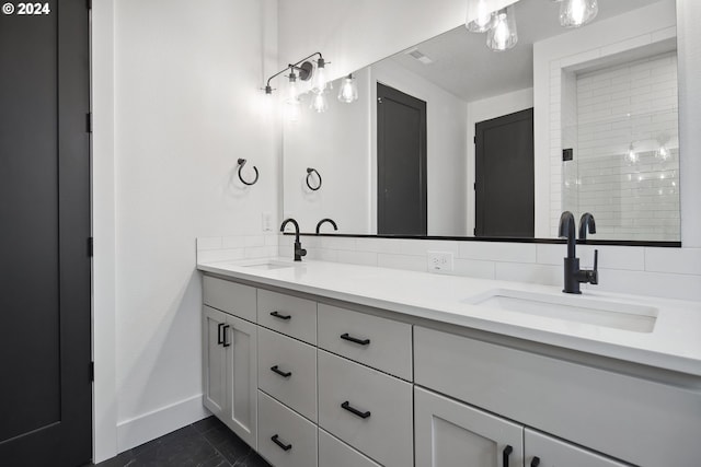 bathroom featuring backsplash, a shower, and vanity