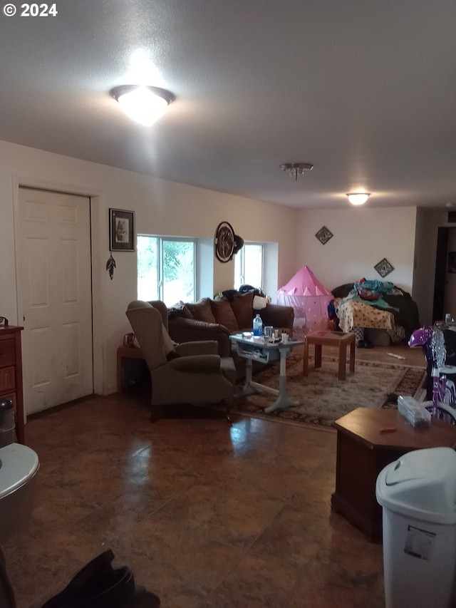 living room with a textured ceiling