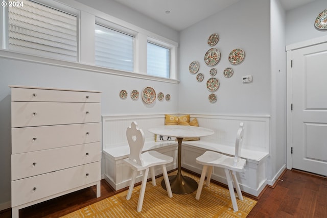 dining room with breakfast area and hardwood / wood-style flooring