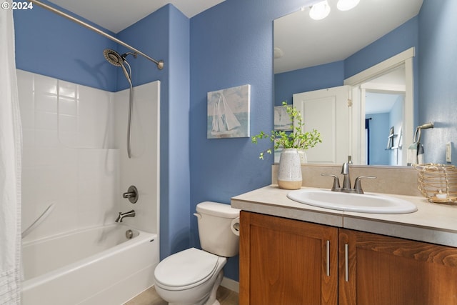 full bathroom with vanity, toilet, and shower / bath combo with shower curtain