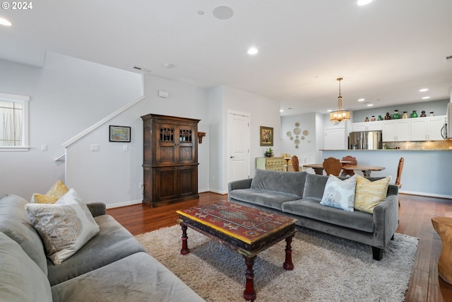 living room featuring dark hardwood / wood-style floors