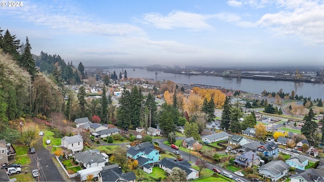 drone / aerial view with a water view