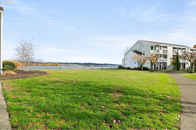 view of yard with a water view