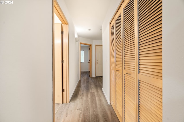 hall featuring light hardwood / wood-style floors