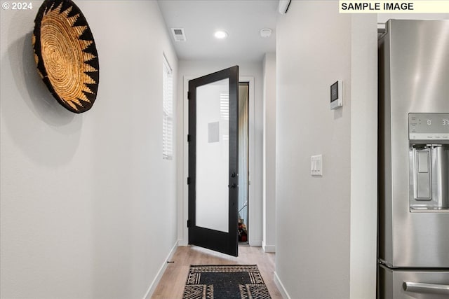 hall featuring light hardwood / wood-style floors