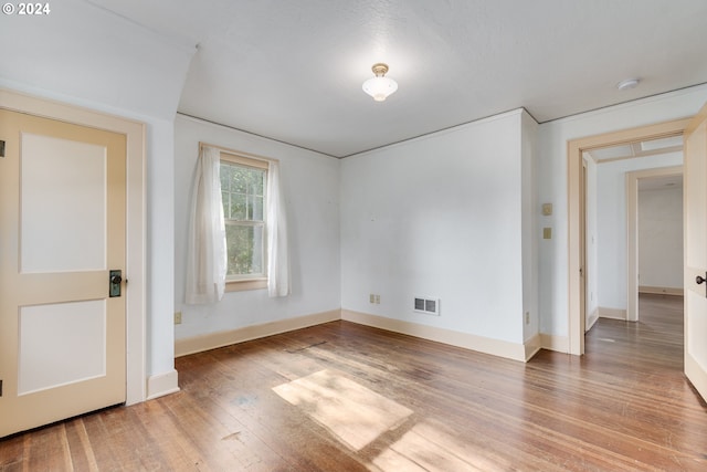 170 N Jefferson St, Eugene, OR 97402 - unfurnished room featuring wood finished floors and a smoke detector