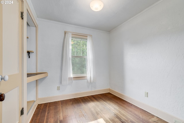 170 N Jefferson St, Eugene, OR 97402 - empty room featuring hardwood / wood-style floors and crown molding