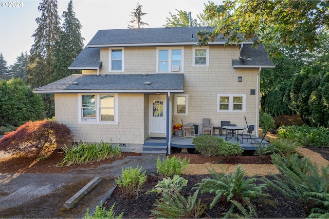 170 N Jefferson St, Eugene, OR 97402 - view of front of home with a shingled roof, a deck, and crawl space