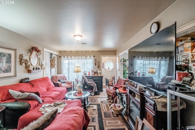 living room featuring dark carpet