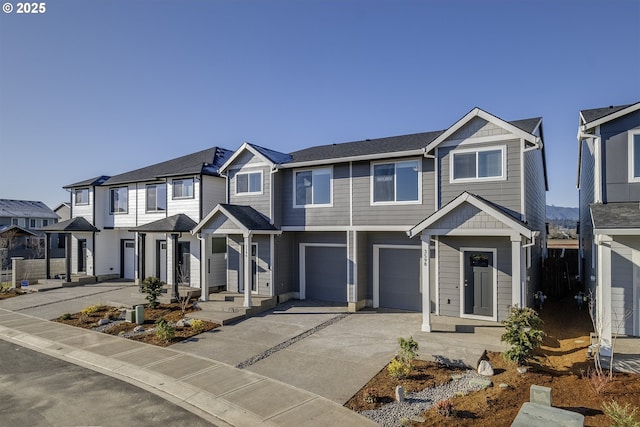 3598 Ash St, Forest Grove, OR 97116 - view of property featuring concrete driveway, a garage, and a residential view