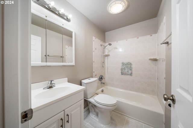 full bathroom with vanity, toilet, tile patterned floors, and tiled shower / bath