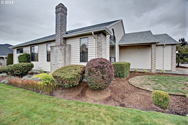 exterior space with a front lawn