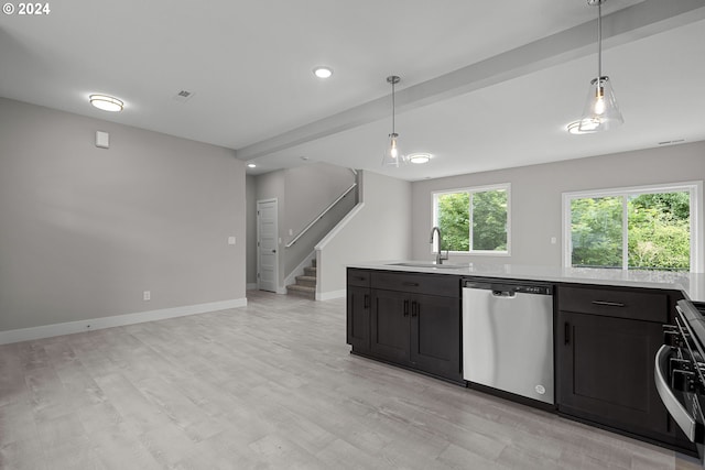 kitchen with beamed ceiling, sink, decorative light fixtures, stainless steel appliances, and light wood-type flooring