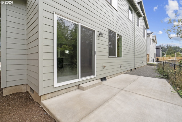 view of home's exterior with a patio