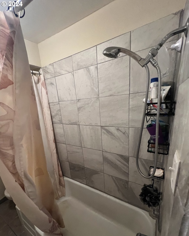 bathroom with shower / bath combo