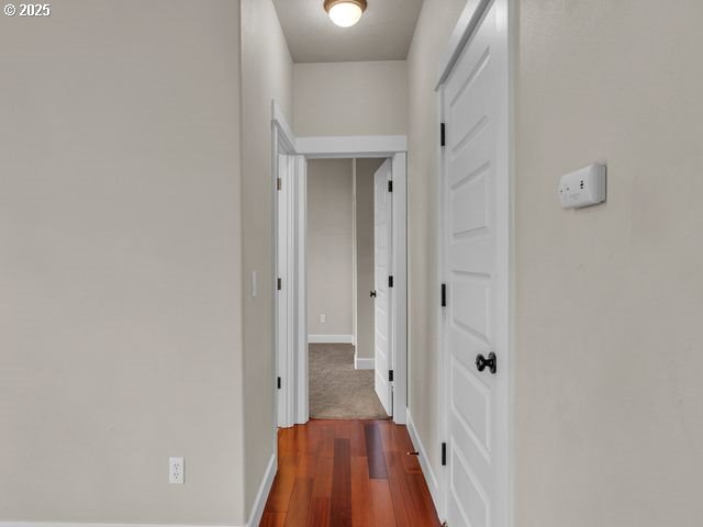 hall featuring dark hardwood / wood-style flooring