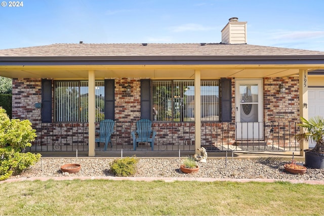 exterior space featuring covered porch