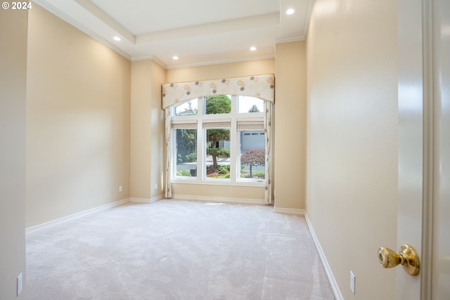 spare room featuring carpet floors, ornamental molding, recessed lighting, and baseboards