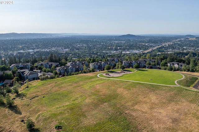 aerial view featuring a mountain view and a residential view