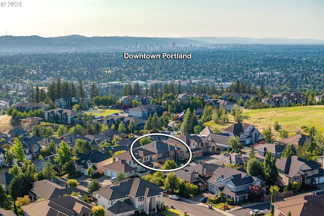 aerial view featuring a residential view and a mountain view