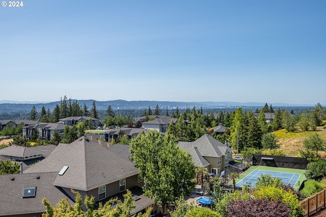 drone / aerial view with a residential view and a mountain view