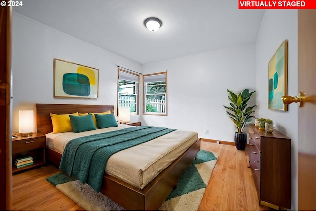 bedroom featuring light hardwood / wood-style floors