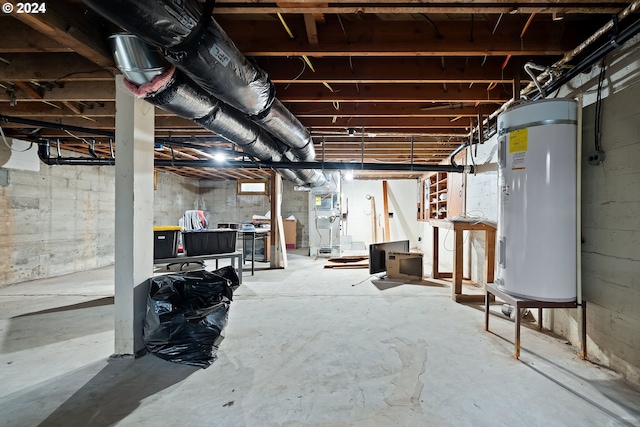 basement featuring electric water heater