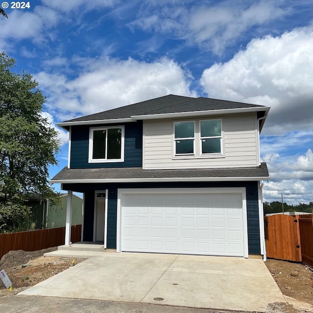 view of front of property with a garage