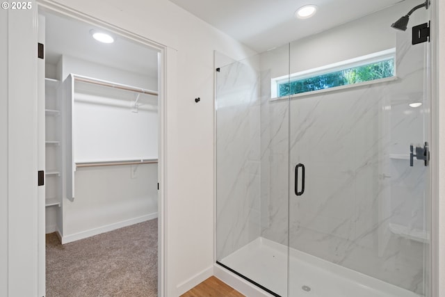 11116 NE 91st Ave, Vancouver, WA 98662 - full bathroom featuring baseboards, recessed lighting, a walk in closet, and a marble finish shower
