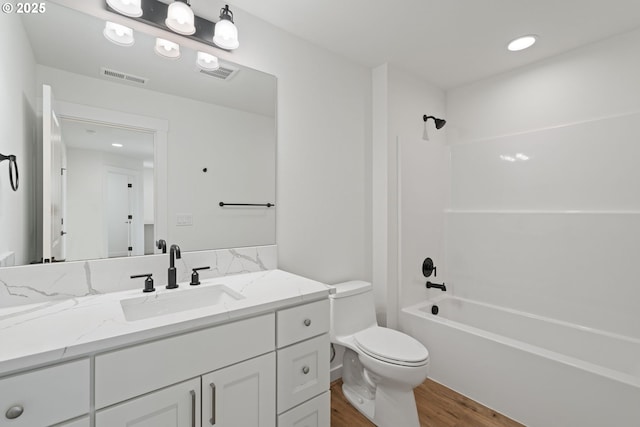 11116 NE 91st Ave, Vancouver, WA 98662 - full bathroom with visible vents, wood finished floors, toilet, and vanity
