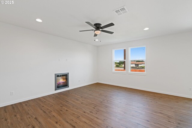 11116 NE 91st Ave, Vancouver, WA 98662 - empty room featuring a glass covered fireplace, ceiling fan, recessed lighting, and visible vents