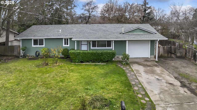 ranch-style home with a garage, fence, driveway, roof with shingles, and a front lawn