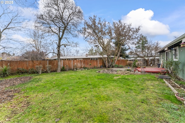 view of yard with a wooden deck