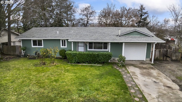 single story home with a garage and a front lawn