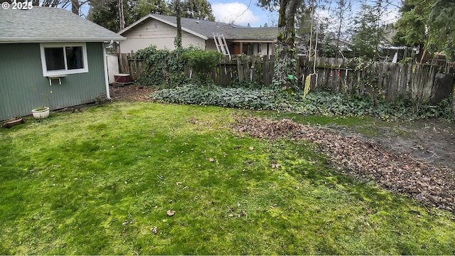 view of yard featuring fence