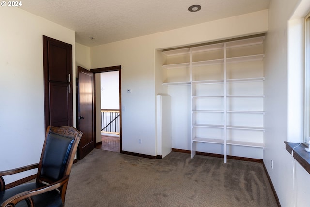 31367 Clarks Creek Rd, Mount Vernon, OR 97865 - unfurnished bedroom featuring carpet flooring, baseboards, and a textured ceiling