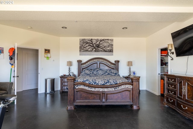 bedroom featuring a textured ceiling