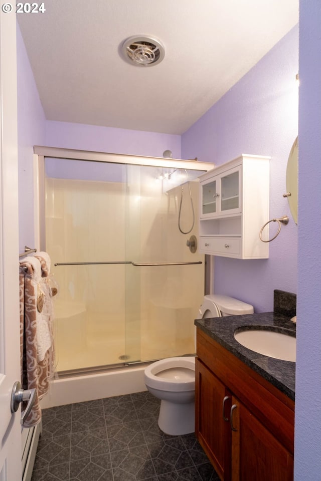 31367 Clarks Creek Rd, Mount Vernon, OR 97865 - bathroom with a stall shower, toilet, and vanity