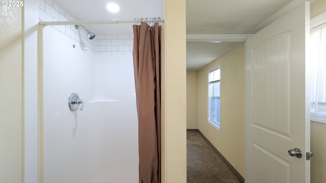 bathroom with a shower with curtain