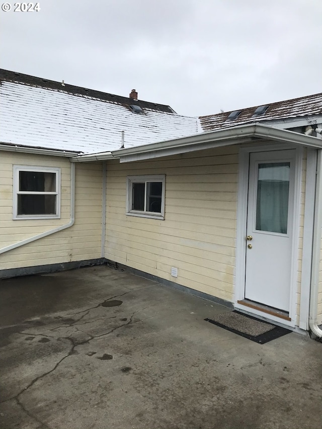 view of home's exterior with a patio