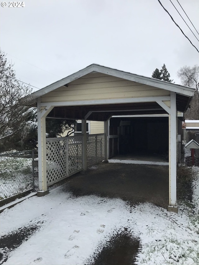 view of snow covered garage