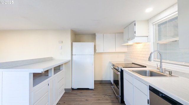 kitchen with sink, white cabinetry, stainless steel appliances, tasteful backsplash, and dark hardwood / wood-style flooring