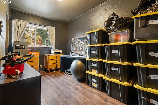 office with wood-type flooring