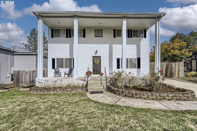 view of front of house with a front lawn