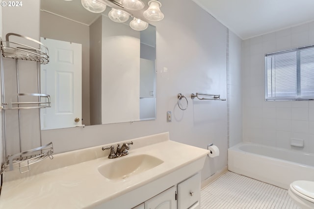 full bathroom with toilet, vanity, tiled shower / bath combo, and tile patterned floors