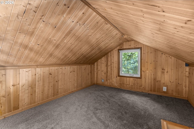 bonus room with lofted ceiling, carpet floors, wooden ceiling, and wood walls